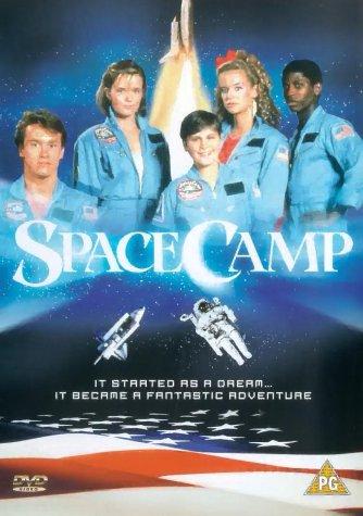 Kelly Preston, Lea Thompson, Joaquin Phoenix, Tate Donovan, and Larry B. Scott in SpaceCamp (1986)