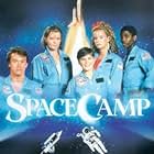 Kelly Preston, Lea Thompson, Joaquin Phoenix, Tate Donovan, and Larry B. Scott in SpaceCamp (1986)