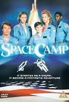 Kelly Preston, Lea Thompson, Joaquin Phoenix, Tate Donovan, and Larry B. Scott in SpaceCamp (1986)