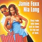 Nia Long and Jamie Foxx in Held Up (1999)