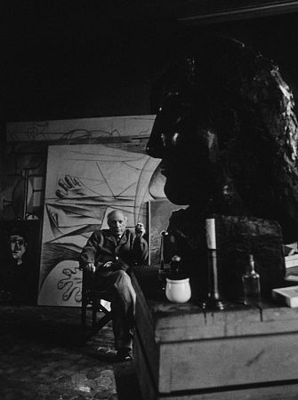 Pablo Picasso sitting in his studio, circa 1950. Modern silver gelatin, 14x11. $600 © 1978 Sanford Roth / LACMA MPTV