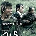 Song Kang-ho, Park Hae-il, and Byun Hee-Bong in The Host (2006)