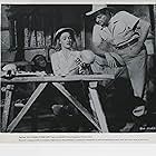 Angela Greene, Johnny Weissmuller, and Tamba in Jungle Jim in the Forbidden Land (1952)