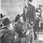 Douglas Kennedy and Forrest Tucker in Ride the Man Down (1952)