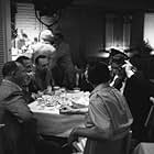 Don Rickles, Buddy Lester, George Sidney, Frank Sinatra, Jack Entratter and Dean Martin having lunch at the Sands Hotel in Las Vegas