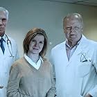 Amir AboulEla, Christian Clemenson, and Jacqueline McKenzie in Malignant (2021)