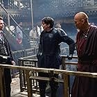 Christian Bale, Christopher Nolan, and Ken Watanabe in Batman Begins (2005)