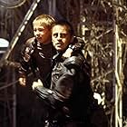 Matt LeBlanc and Jack Johnson in Lost in Space (1998)