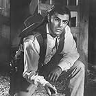 John Saxon in The Plunderers (1960)