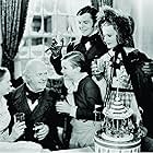 June Lockhart, Lynne Carver, Terry Kilburn, Barry MacKay, and Reginald Owen in A Christmas Carol (1938)