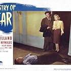 Ray Milland, Carl Esmond, and Marjorie Reynolds in Ministry of Fear (1944)