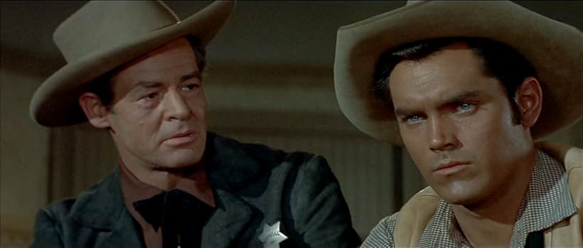 Jeffrey Hunter and Robert Ryan in The Proud Ones (1956)