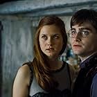 Daniel Radcliffe and Bonnie Wright in Harry Potter and the Deathly Hallows: Part 1 (2010)