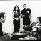 Hugh Cornwell, Ben Thomas, Ras Barker, and Annette Ross in Somewhere (2005)