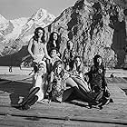 Mona Chong, Julie Ege, Anouska Hempel, George Lazenby, Joanna Lumley, Helena Ronee, Catherine Schell, and Zaheera in On Her Majesty's Secret Service (1969)