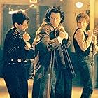 John Travolta, JoAnn Fregalette Jansen, and Jane Lanier in Michael (1996)