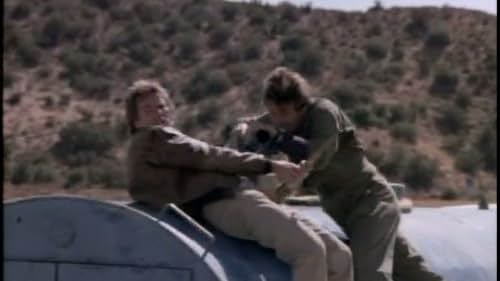 Richard Dean Anderson and Art Hindle in MacGyver (1985)