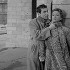 Janine Darcey and Robert Hossein in Rififi (1955)