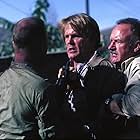 Gene Hackman, Ed Harris, and Nick Nolte in Under Fire (1983)