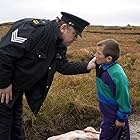 Brendan Gleeson and Mícheál Óg Lane in The Guard (2011)