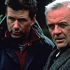 Anthony Hopkins and Alec Baldwin in The Edge (1997)