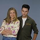 Sarah Chalke and Glenn Quinn in Roseanne (1988)