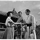 Clark Gable, Ava Gardner, and Denis O'Dea in Mogambo (1953)