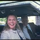 Kathleen Turner and James Woods co-star as the parents of the Lisbon girls