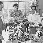 Steve Guttenberg, Tom Selleck, Ted Danson, Nancy Travis, and Robin Weisman in Three Men and a Little Lady (1990)