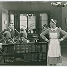 Valdemar Dalquist, Isa Quensel, and Olav Riégo in Hemslavinnor (1933)