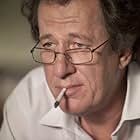 Geoffrey Rush in Candy (2006)