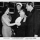 William Holden, Mickey Rooney, Keiko Awaji, and Earl Holliman in The Bridges at Toko-Ri (1954)