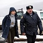 Graham Greene and Elizabeth Olsen in Wind River (2017)