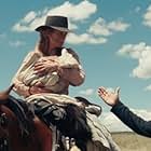 Christian Bale and Rosamund Pike in Hostiles (2017)