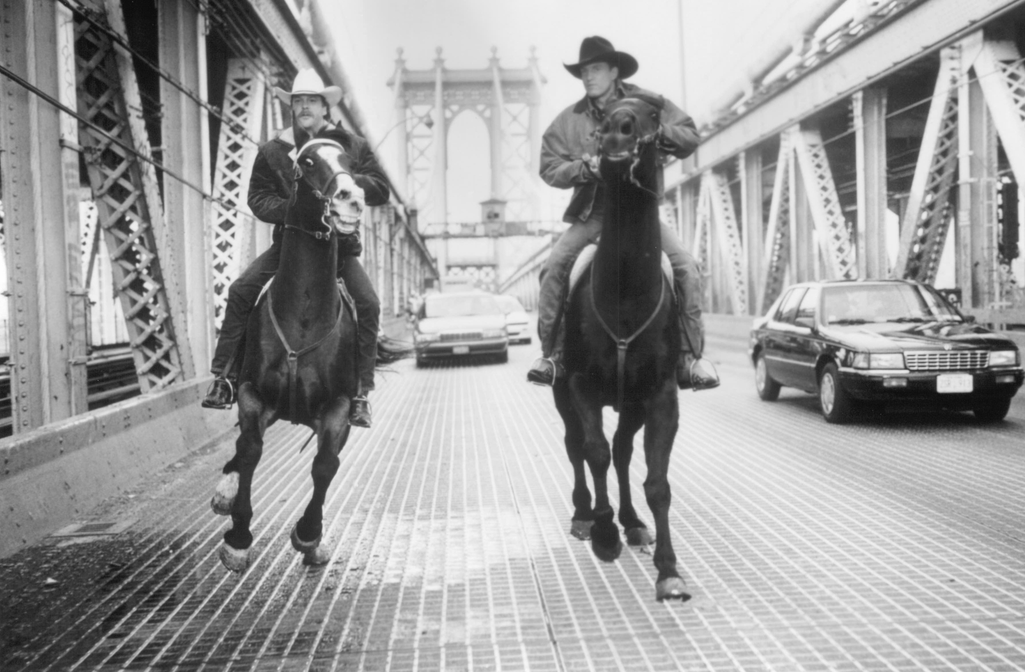 Woody Harrelson and Kiefer Sutherland in The Cowboy Way (1994)