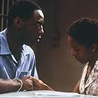 LisaGay Hamilton and Isaiah Washington in True Crime (1999)