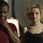 Ashley Bell, Julia Garner, Erica Michelle Singleton, and Sharice A. Williams in The Last Exorcism Part II (2013)