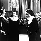 Whoopi Goldberg, Kathy Najimy, Wendy Makkena, and Mary Wickes in Sister Act (1992)