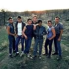 Tom Cruise, Matt Dillon, Emilio Estevez, Rob Lowe, Patrick Swayze, C. Thomas Howell, and Ralph Macchio in The Outsiders (1983)