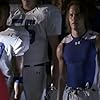 Taylor Kitsch and Gaius Charles in Friday Night Lights (2006)