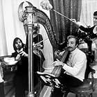 "Magic Christian, The" Ringo Starr plays the flute while Peter Sellar dabbles with the harp. 1969 Commonwealth United / MPTV