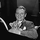 James Cagney Cagney's brother brought his pet lion for a visit on the set of "Come Fill The Cup" 1951 Warner