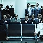 Lee Jung-jae, Hwang Jung-min, Choi Il-hwa, Kwon Tae-won, Park Sung-woong, Kim Yoon-seong, Kim Hong-pa, and Jang Gwang in New World (2013)