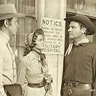 Douglas Kennedy, Dorothy Malone, and Joel McCrea in South of St. Louis (1949)