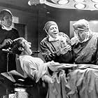 Bernard Bresslaw, Frankie Howerd, Sidney James, and Kenneth Williams in Carry on Doctor (1967)