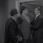Roger Moore, Robert Cawdron, and John Serret in The Saint (1962)