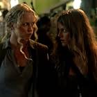 Anna Lise Phillips and Tracy Spiridakos in Revolution (2012)