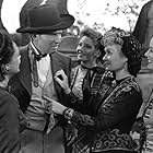Constance Bennett, Julie Bishop, Bruce Cabot, Lucia Carroll, and Faye Emerson in Wild Bill Hickok Rides (1942)