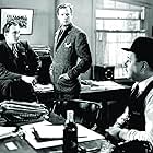 George Sanders, Robert Benchley, and Joel McCrea in Foreign Correspondent (1940)