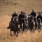 Eric Cantona, Jeffrey Dean Morgan, and David James in The Salvation (2014)